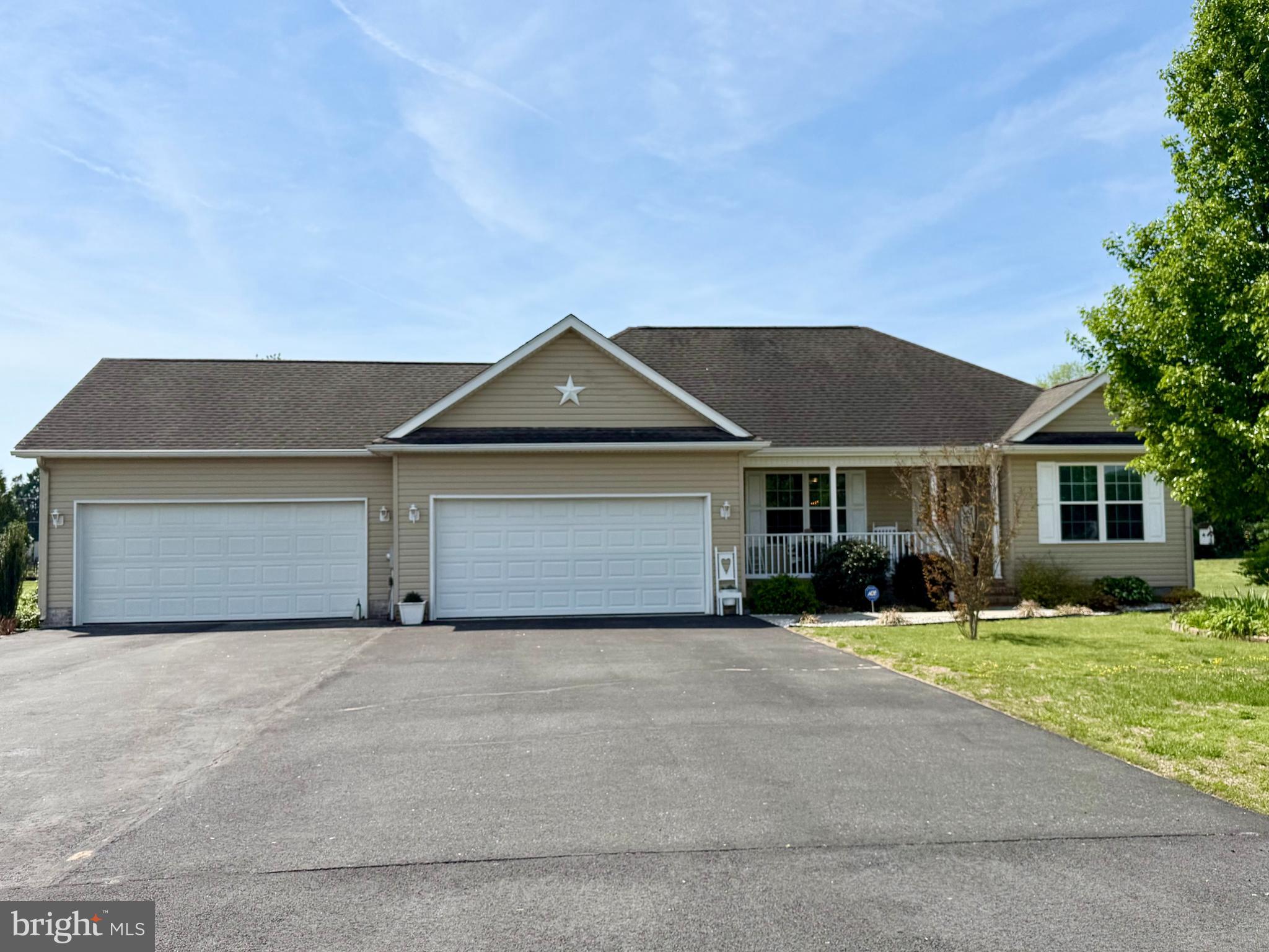 front view of a house with yard