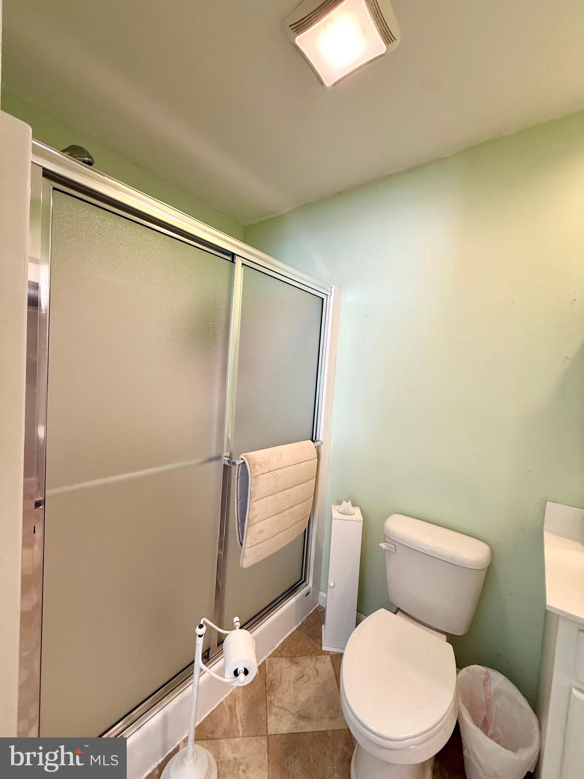 11684 Kensington Way Laurel, DE 19956 - Photo 33 of 43 a white toilet sitting next to a bathroom sink