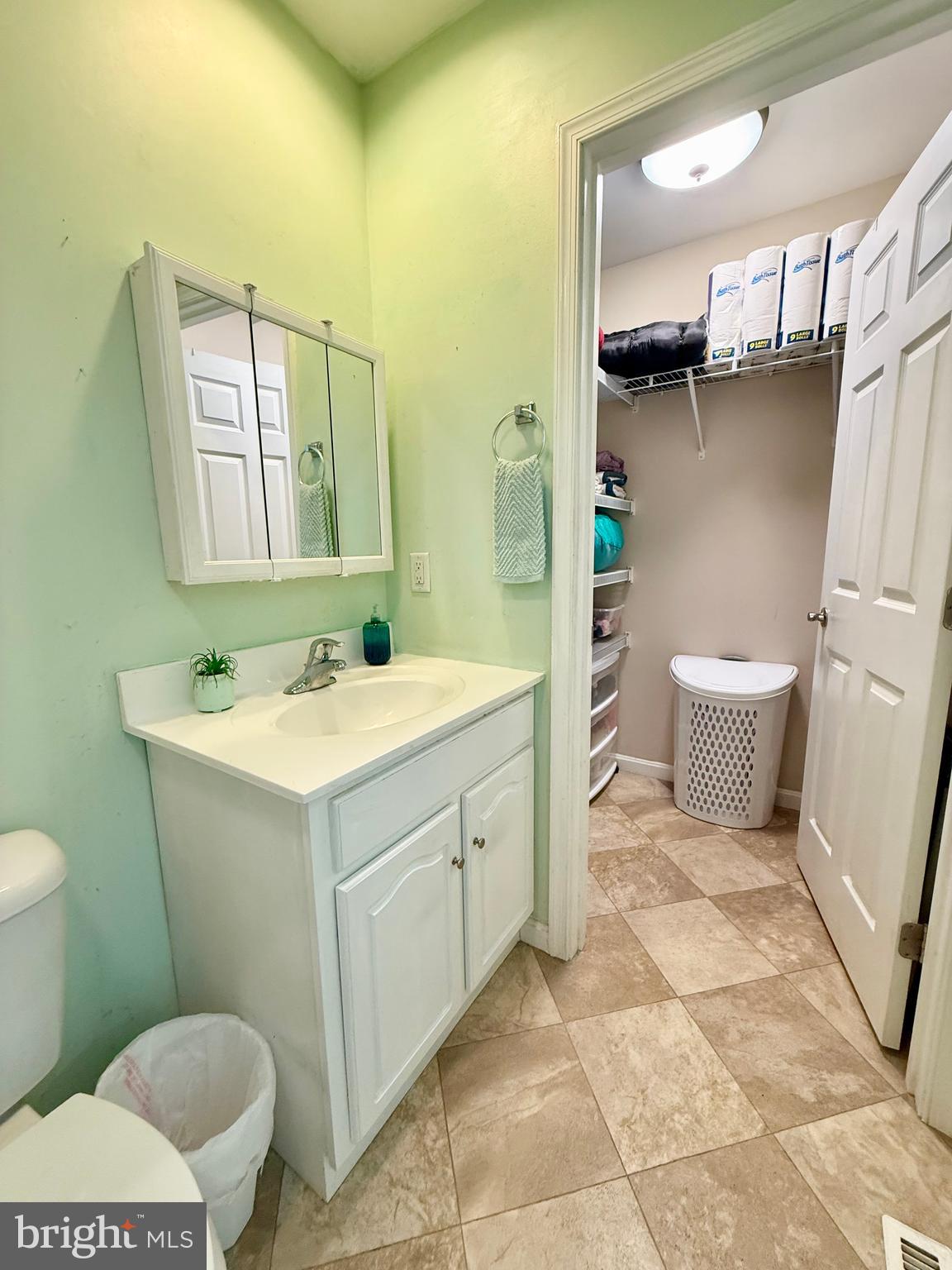 11684 Kensington Way Laurel, DE 19956 - Photo 35 of 43 a bathroom with a sink a toilet and a mirror