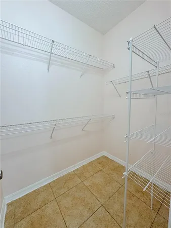a view of a room with racks on the wall