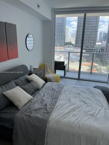 a kitchen with granite countertop a stove and a cabinets