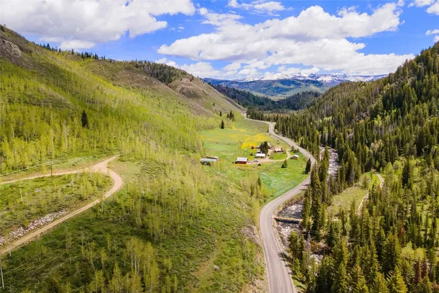 a view of mountain with sunset