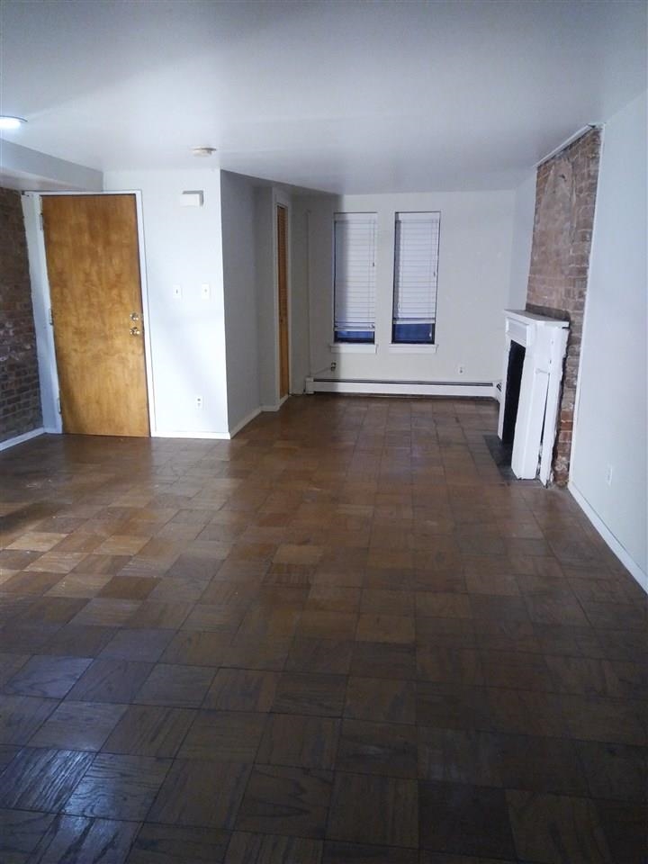 220 Garden Street, Unit 1(GRND) Hoboken, NJ 07030 - Photo 2 of 9 a view of an empty room