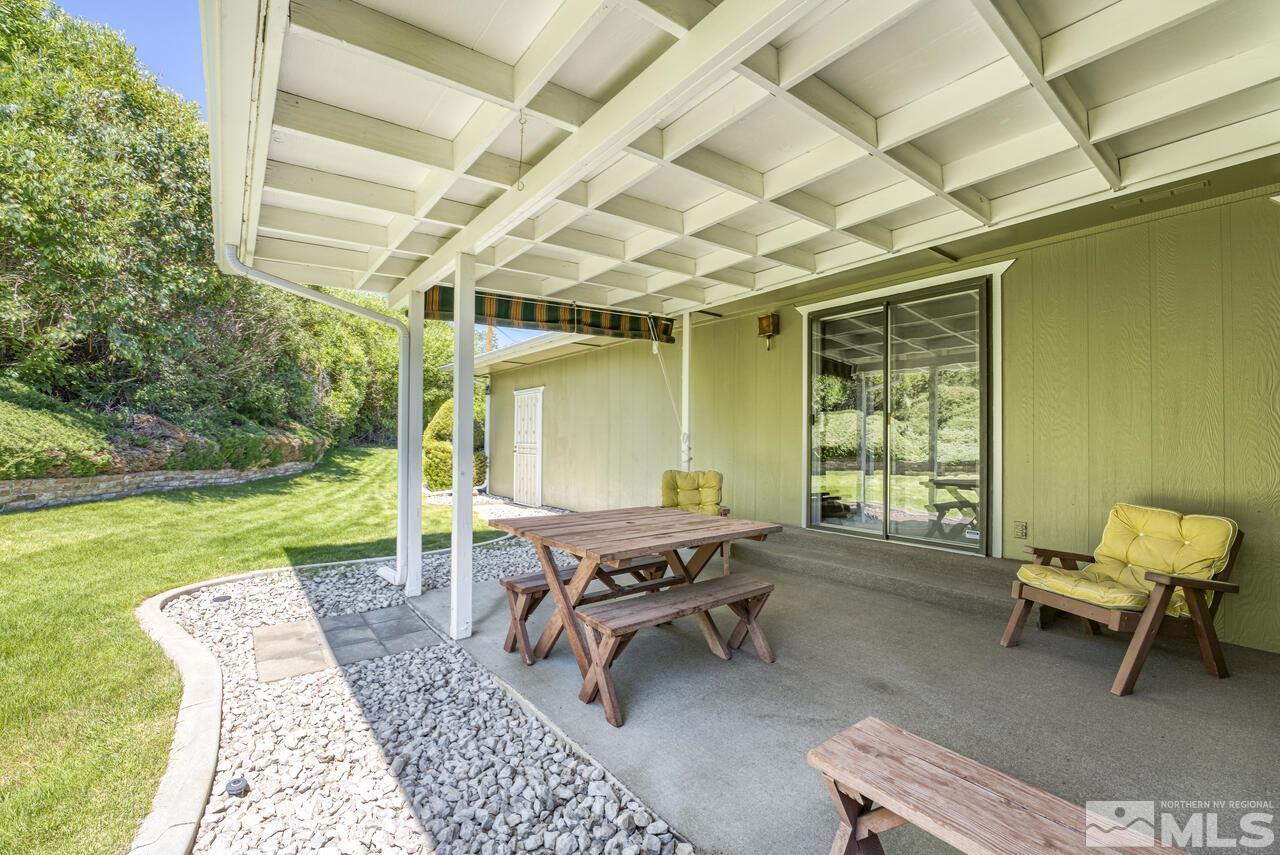 1290 Belford Road Reno, NV 89509 - Photo 25 of 33 a backyard of a house with outdoor seating
