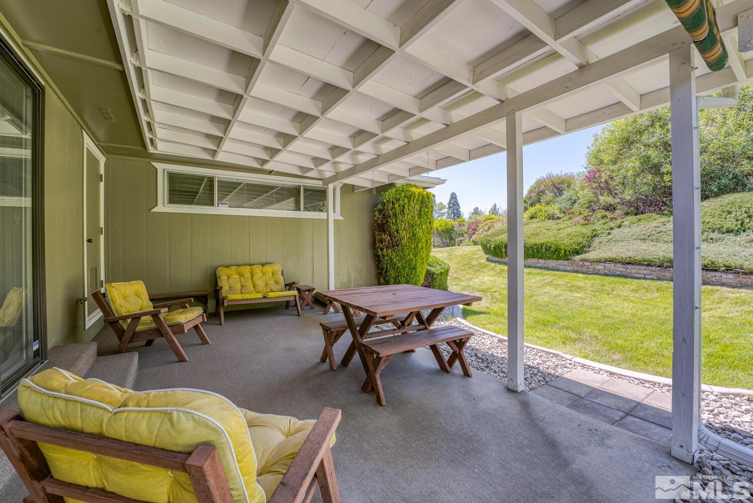 1290 Belford Road Reno, NV 89509 - Photo 27 of 33 a balcony with furniture and a view of the back