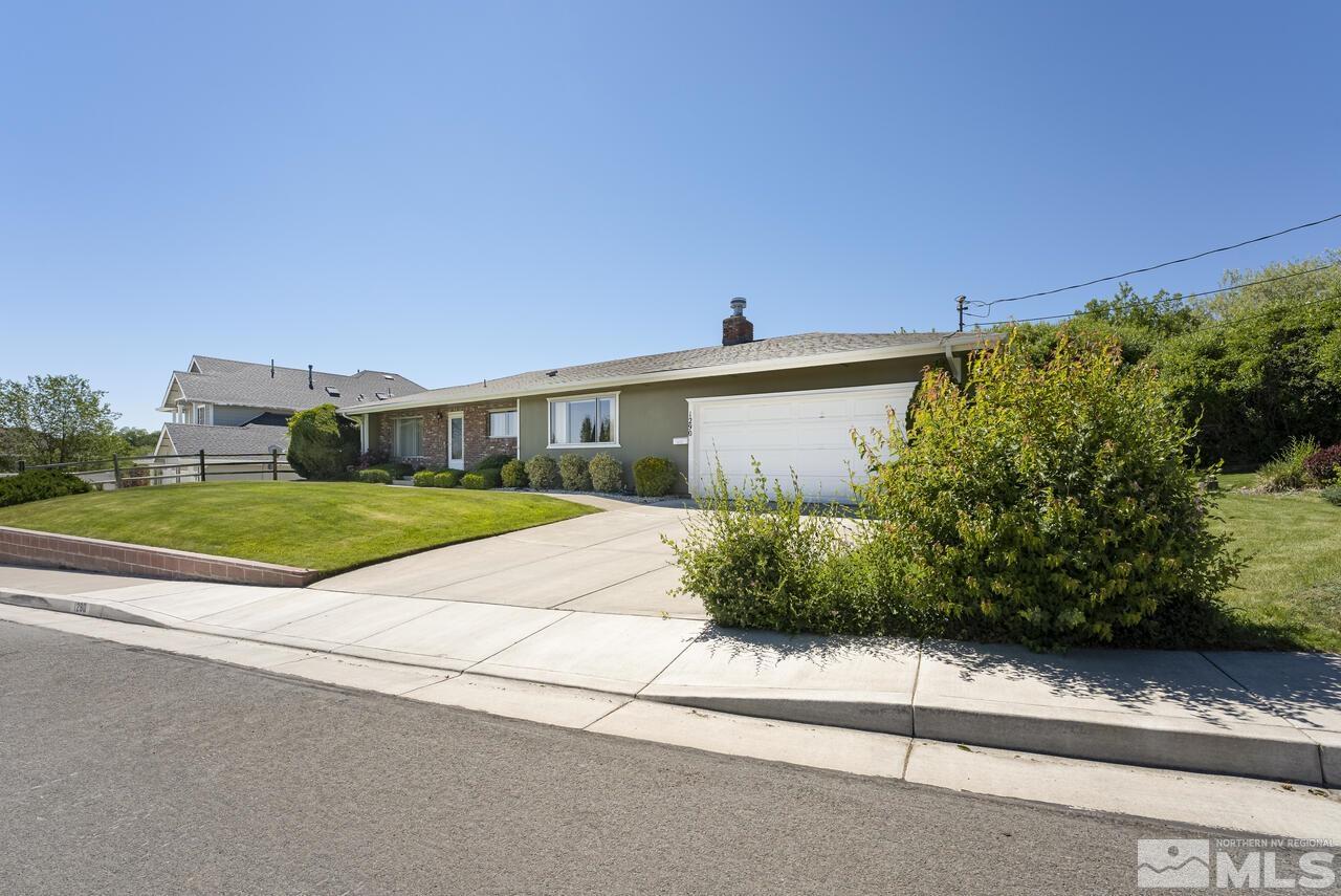 1290 Belford Road Reno, NV 89509 - Photo 3 of 33 a view of house with outdoor space and garden
