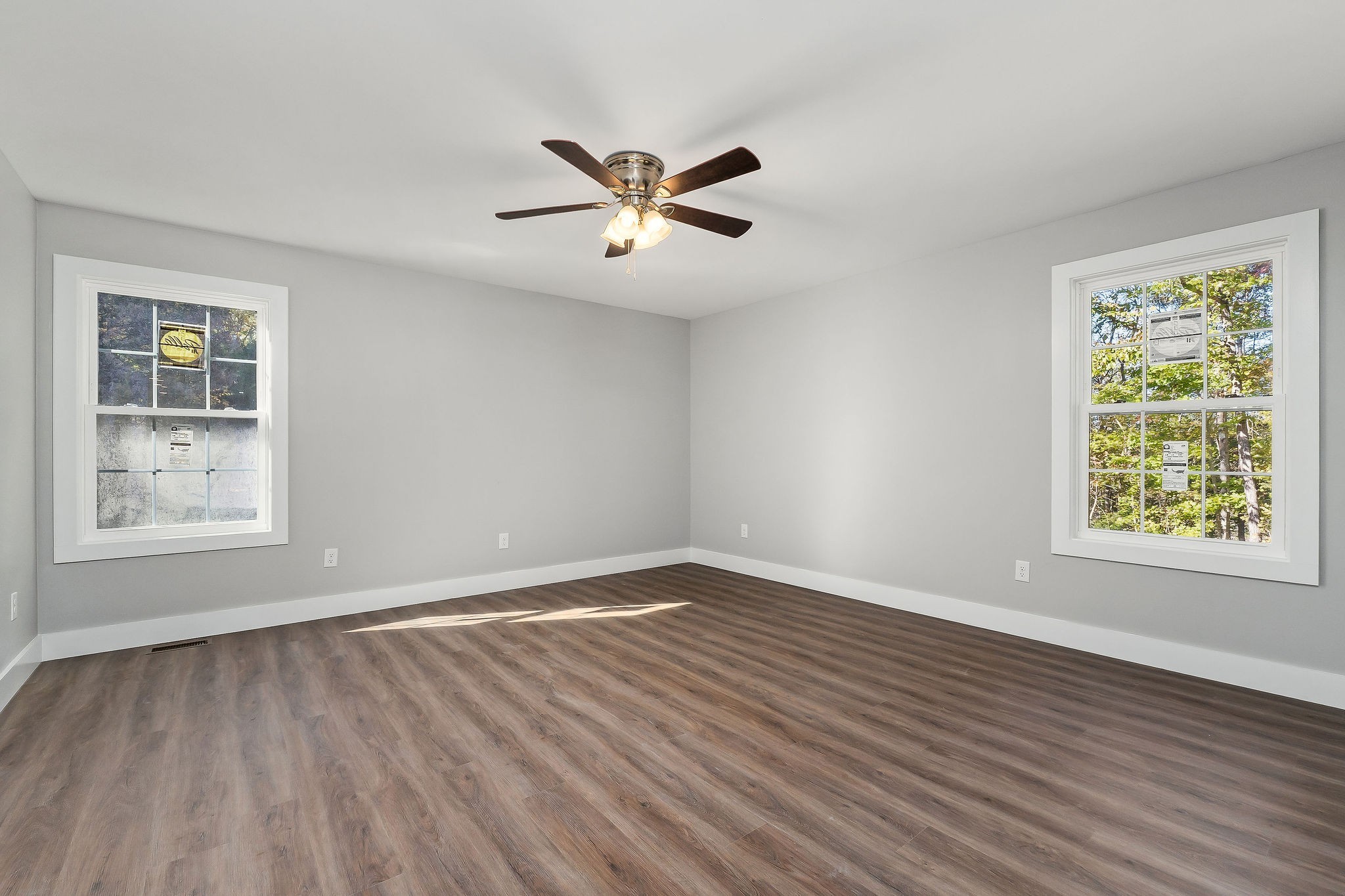 1053 Benton Tidwell Road Hilham, TN 38568 - Photo 16 of 39 a view of an empty room with wooden floor and a window