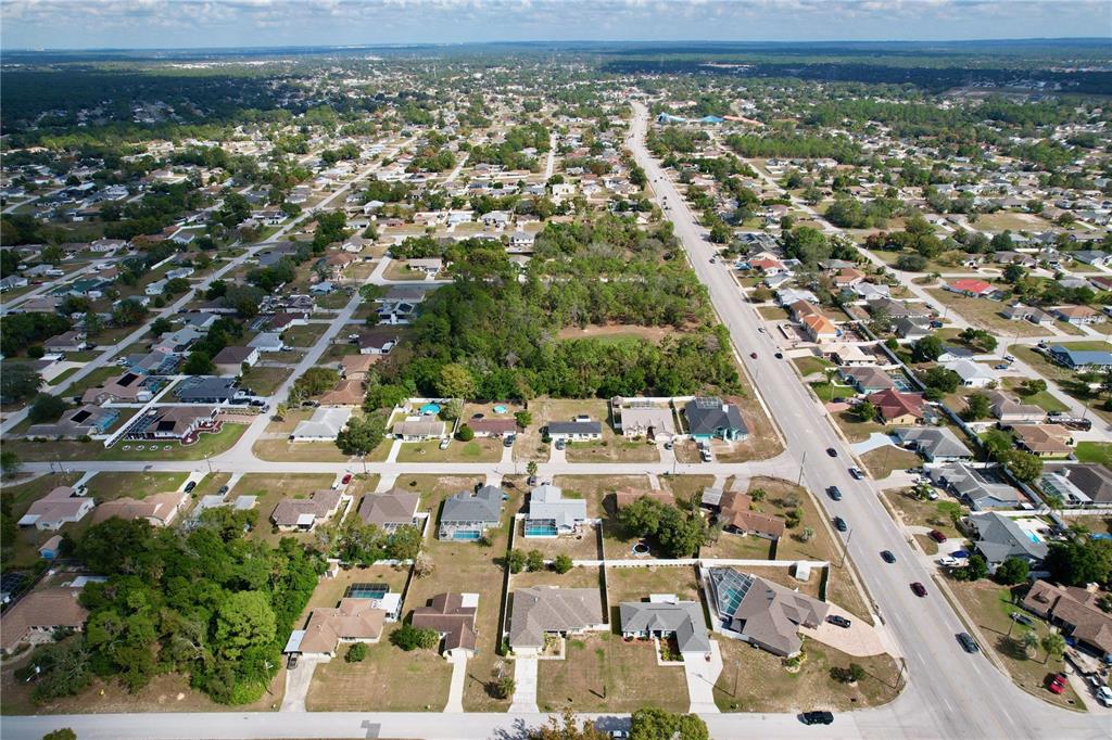 4372 Odin Street Spring Hill, FL 34608 - Photo 38 of 38 an aerial view of residential houses with outdoor space