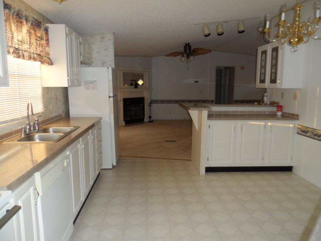 140 East Biggs Road Portland, TN 37148 - Photo 6 of 10 a kitchen with a sink and a stove top oven