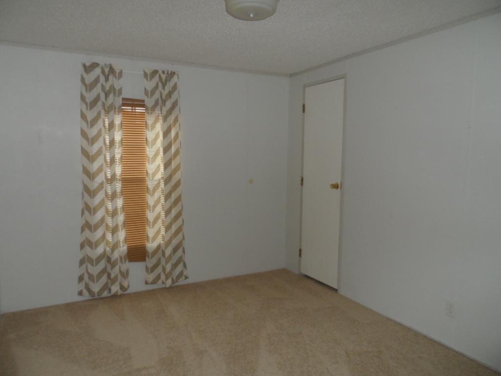 140 East Biggs Road Portland, TN 37148 - Photo 8 of 10 a view of an empty room with a window