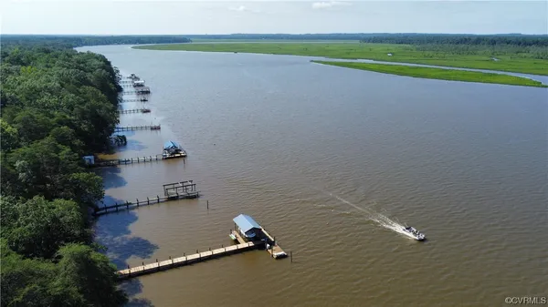 a view of a lake with a big yard