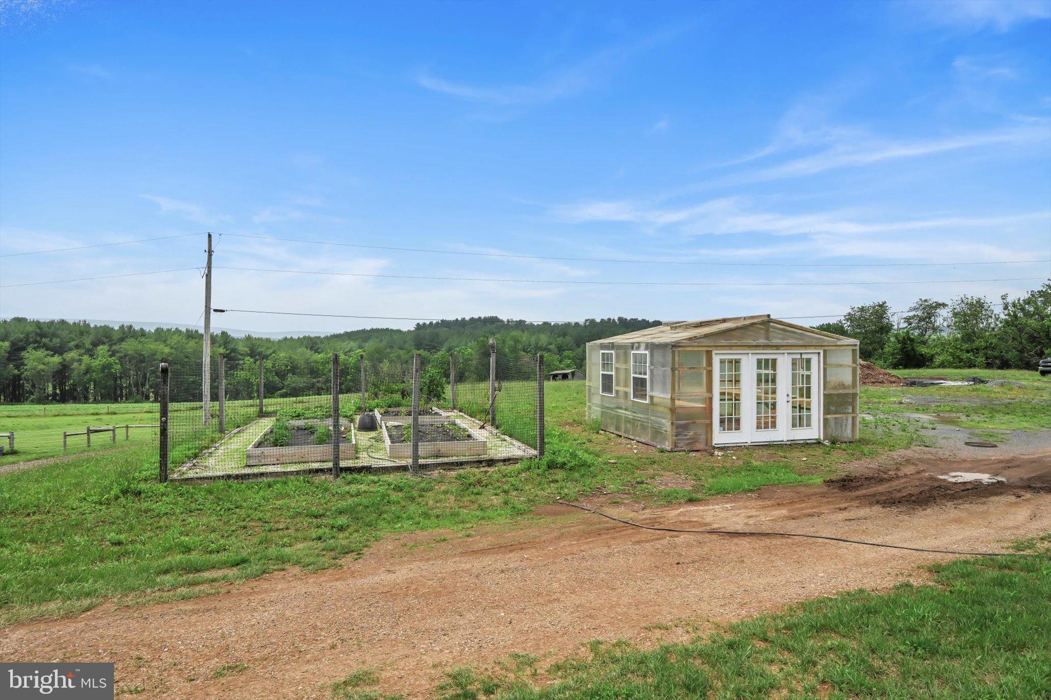 19 Kutz Road Schuylkill Haven, PA 17972 - Photo 53 of 69 Greenhouse and garden beds