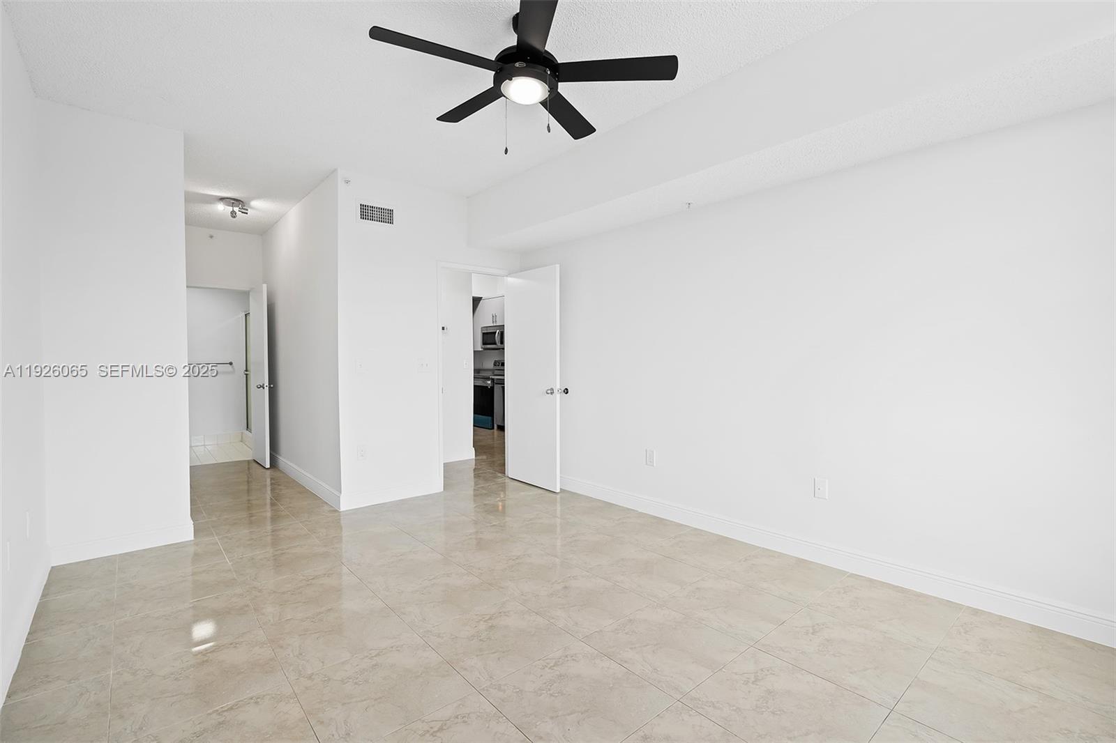 6992 Southwest 39th Street, Unit I302 Davie, FL 33314 - Photo 14 of 23 a view of an empty room