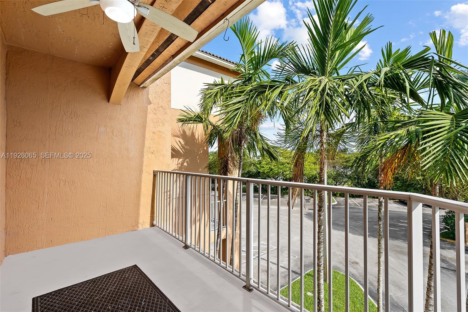 6992 Southwest 39th Street, Unit I302 Davie, FL 33314 - Photo 23 of 23 a view of a balcony with a plant