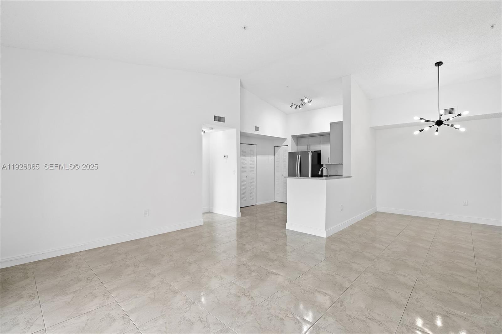 6992 Southwest 39th Street, Unit I302 Davie, FL 33314 - Photo 8 of 23 a view of a kitchen with a sink