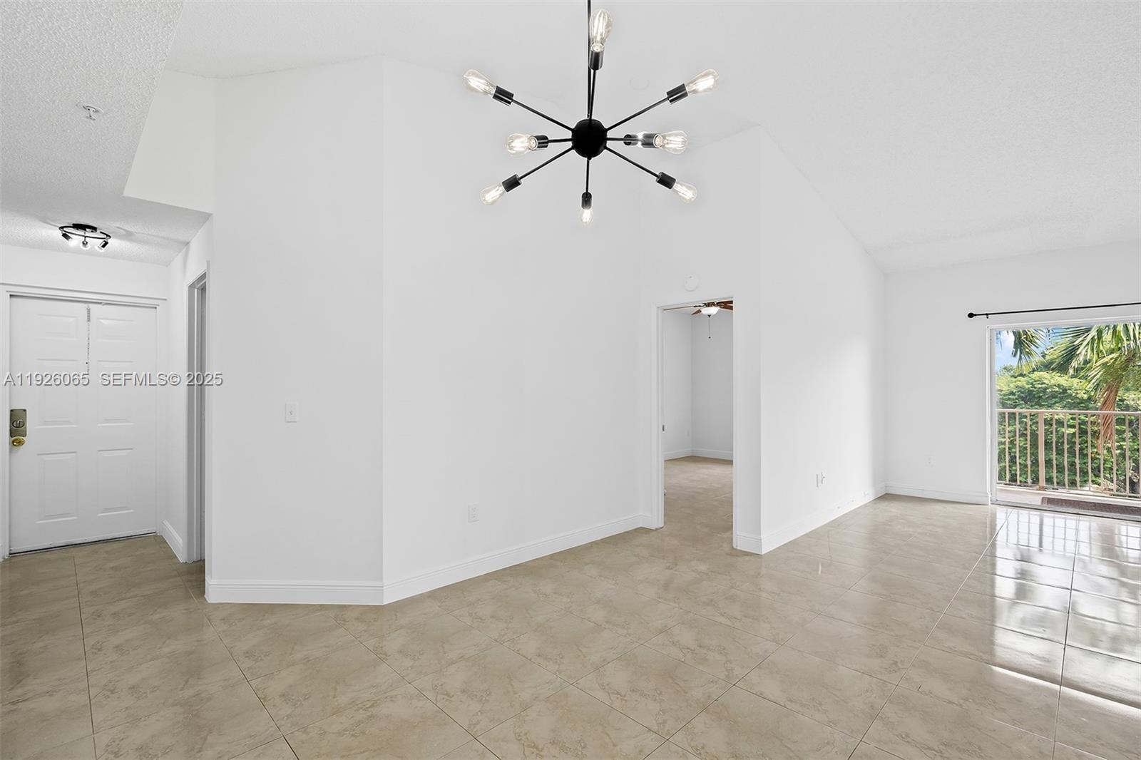 6992 Southwest 39th Street, Unit I302 Davie, FL 33314 - Photo 10 of 23 an empty room