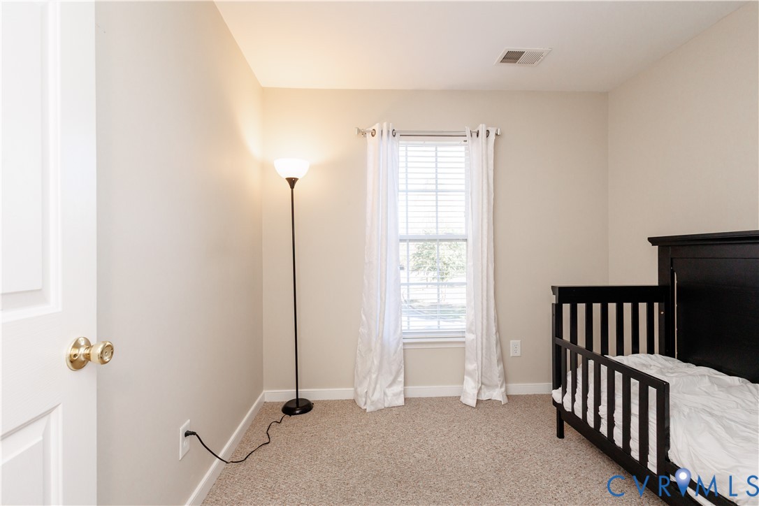 405 Hollybrook Ridge Lane Richmond, VA 23223 - Photo 30 of 37 a view of an empty room with a window