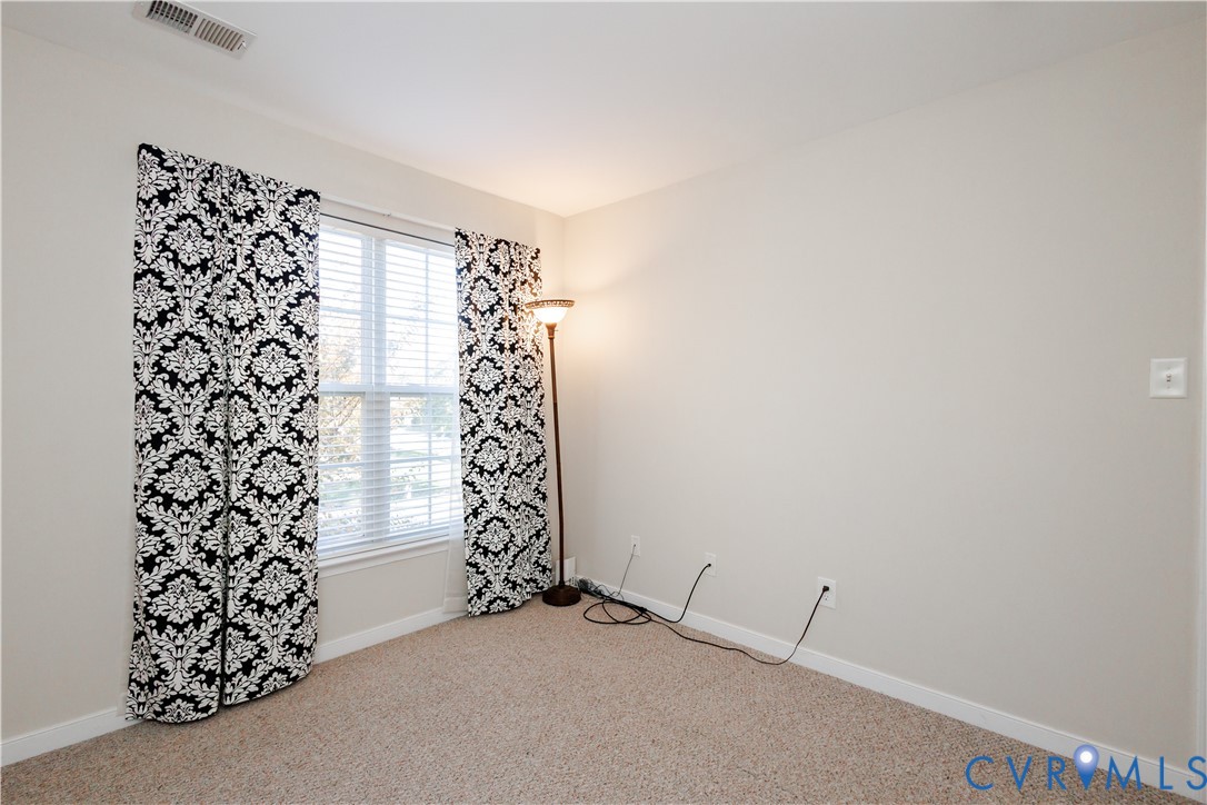 405 Hollybrook Ridge Lane Richmond, VA 23223 - Photo 33 of 37 a view of an empty room with a window