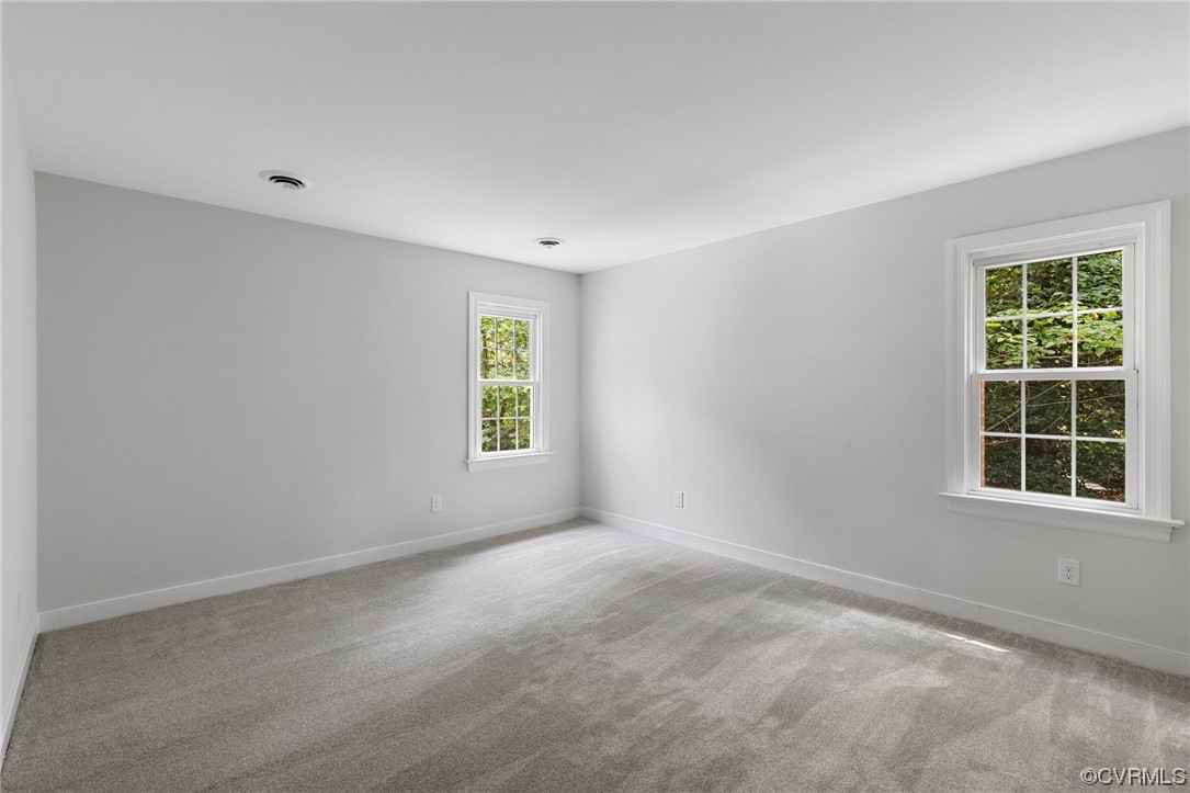 507 Rivers Bend Circle Chester, VA 23836 - Photo 33 of 41 an empty room with windows