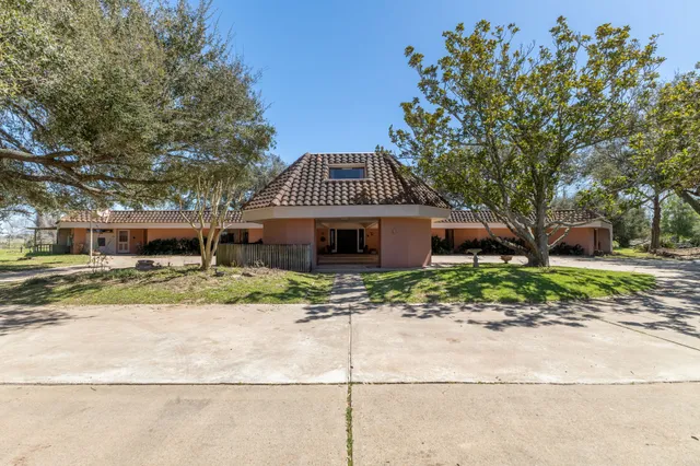 a room with furniture and a rug