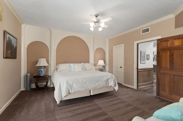 a view of cabinets with wooden floor