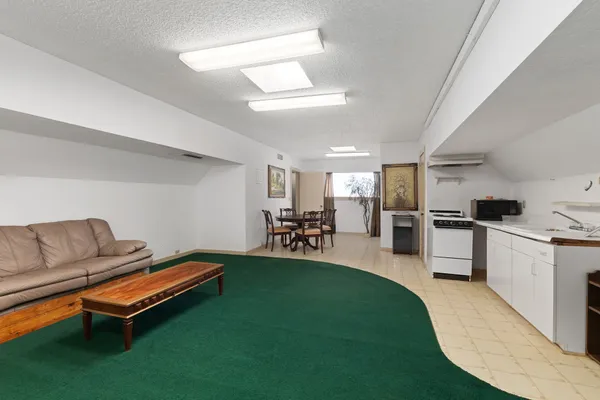 a front view of house with yard and seating area