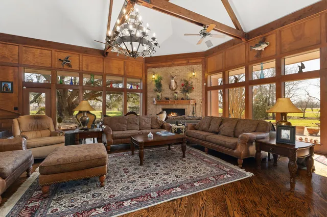 a kitchen with cabinets and window