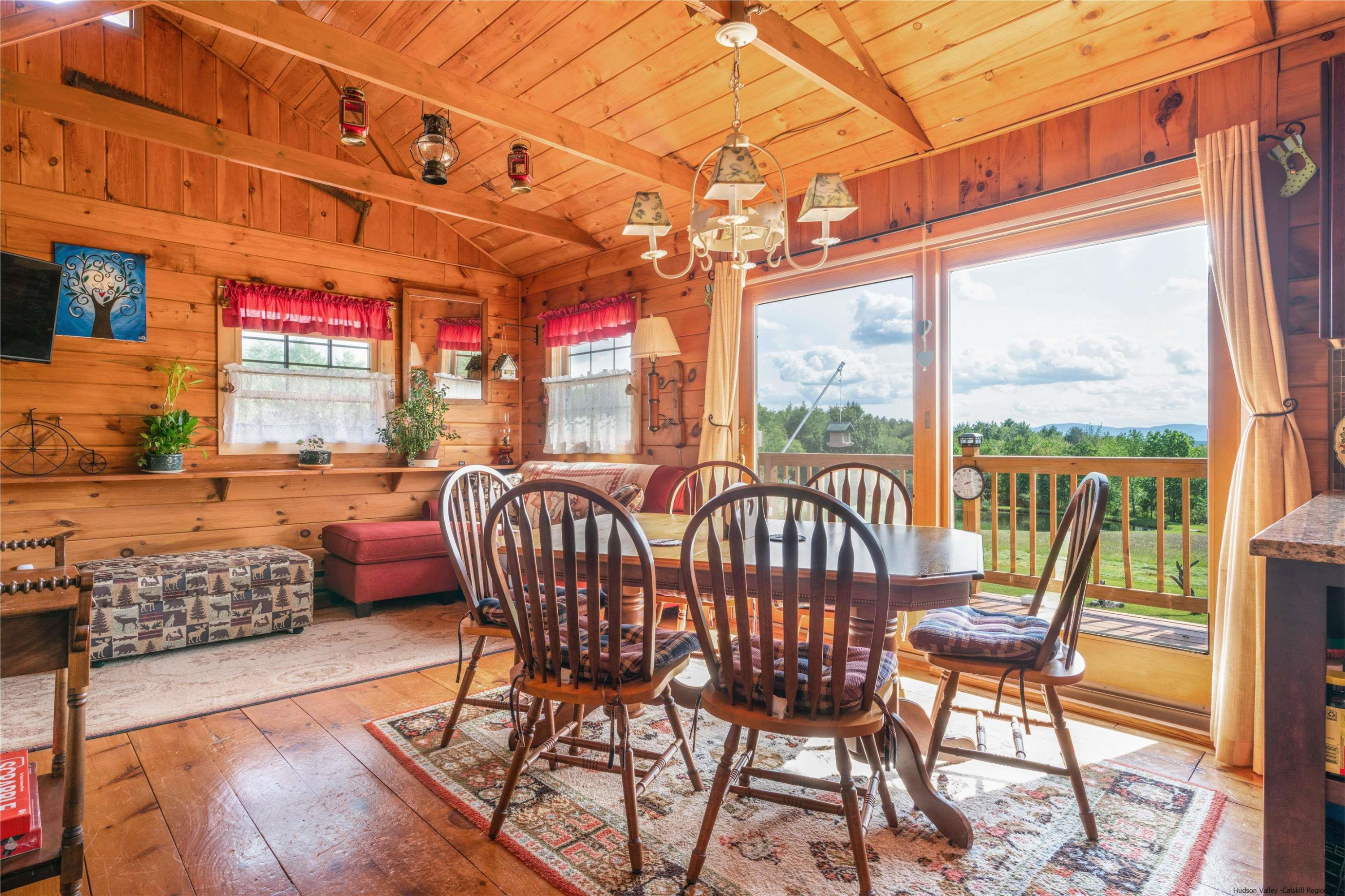 356 C Buel Road Gilboa, NY 12076 - Photo 14 of 30 a view of a chairs and table in the balcony