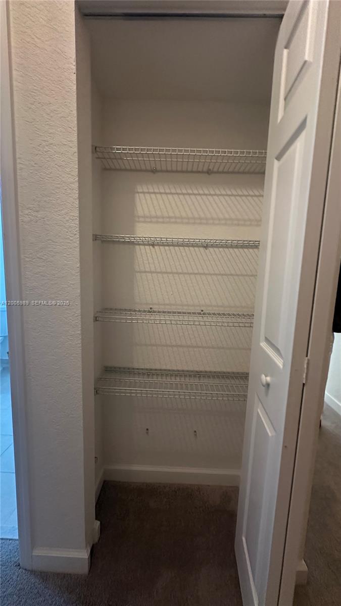 3423 West 110th Street Hialeah, FL 33018 - Photo 29 of 42 a view of walk in closet