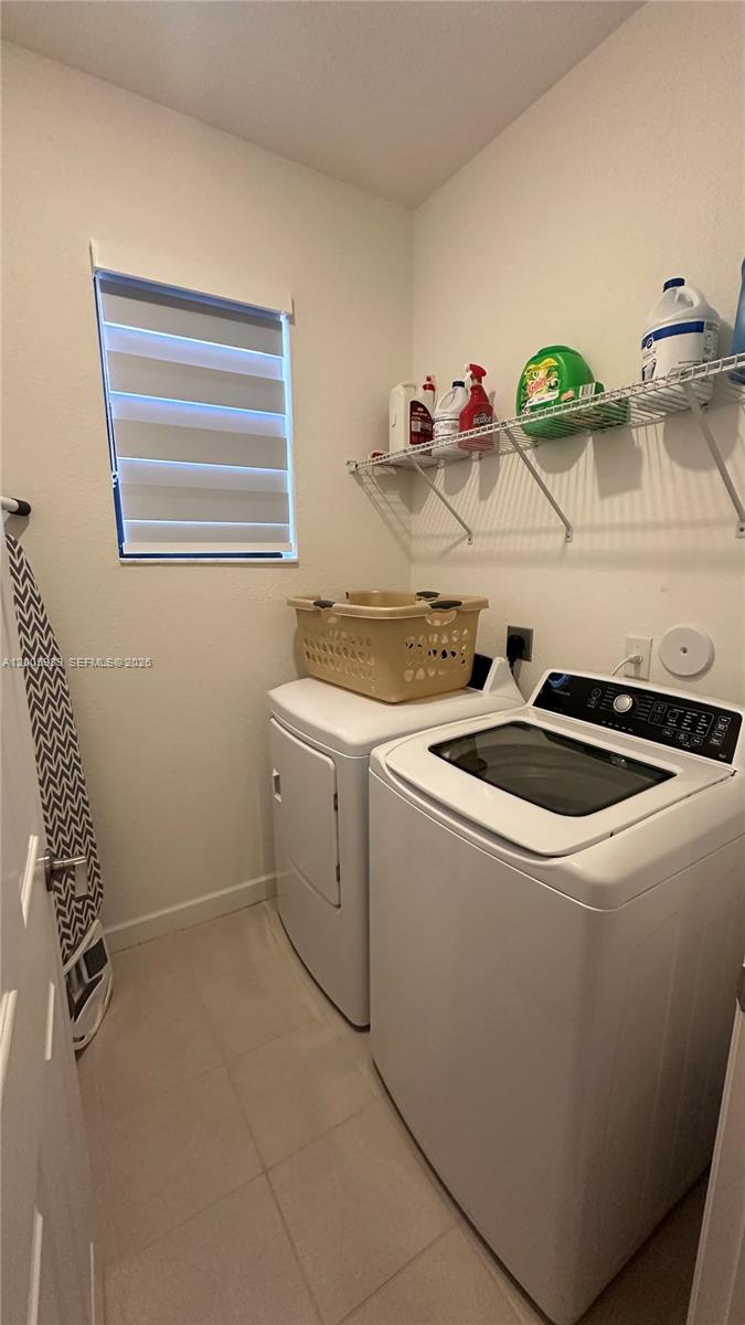 3423 West 110th Street Hialeah, FL 33018 - Photo 30 of 42 a utility room with dryer and washer