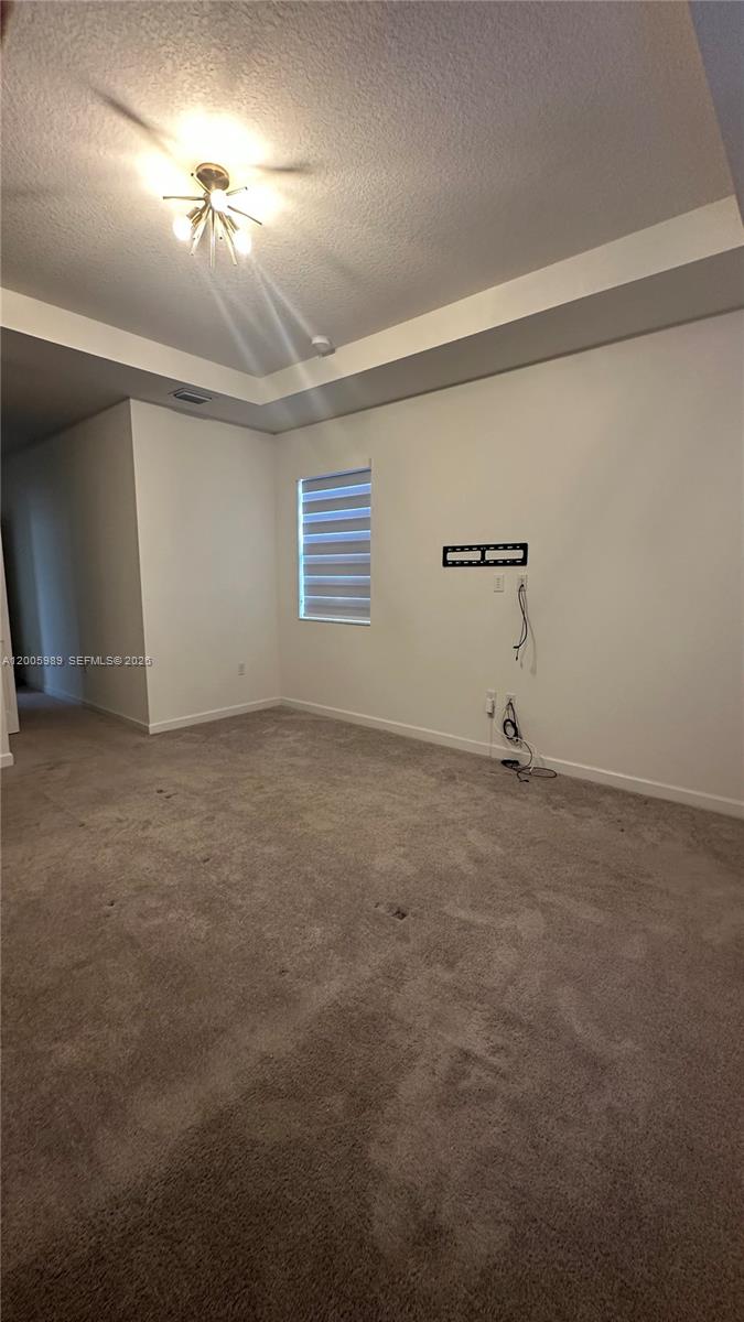 3423 West 110th Street Hialeah, FL 33018 - Photo 36 of 42 a view of room with a ceiling fan
