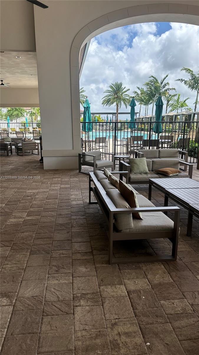 3423 West 110th Street Hialeah, FL 33018 - Photo 38 of 42 a terrace with outdoor seating and city view