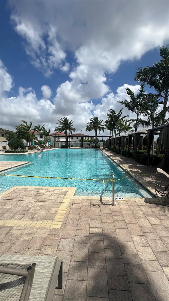 3423 West 110th Street Hialeah, FL 33018 - Photo 41 of 42 a view of a lake with a yard