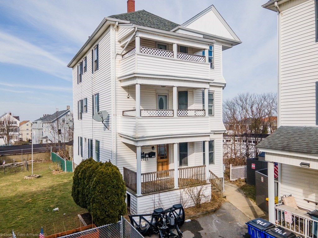170 Buffinton Street Fall River, MA 02721 - Photo 1 of 38 a front view of a house with a yard
