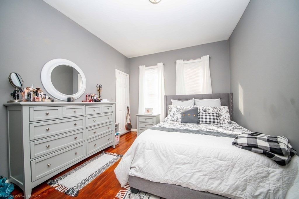 170 Buffinton Street Fall River, MA 02721 - Photo 12 of 38 a bedroom with a bed and a dresser