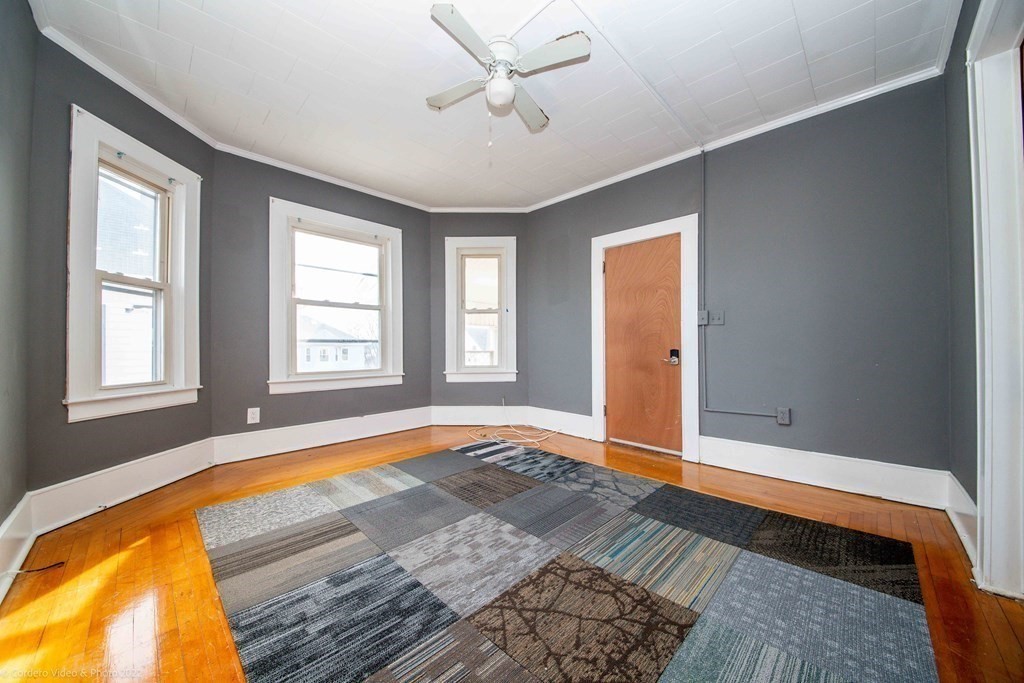 170 Buffinton Street Fall River, MA 02721 - Photo 15 of 38 a bedroom with a bed and a window