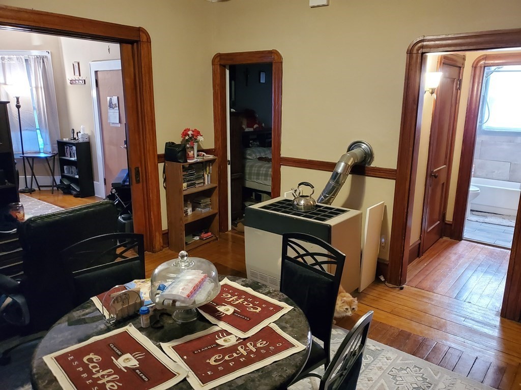 170 Buffinton Street Fall River, MA 02721 - Photo 30 of 38 a room with furniture and a wooden floor