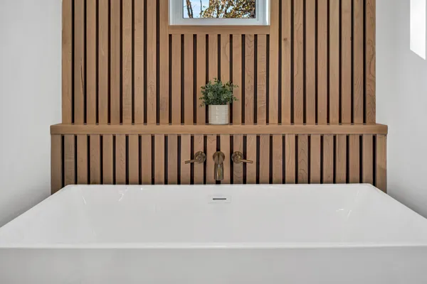 a bathroom with a double vanity sink mirror and double