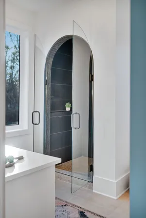 an entryway of a room with wooden floor