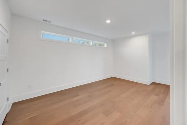 a view of a park with large trees