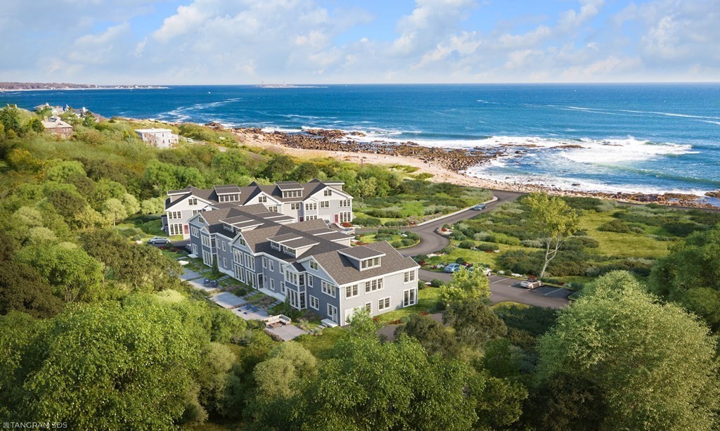 163 Atlantic Road, Unit 3 Gloucester, MA 01930 - Photo 1 of 12 a view of a city with an ocean view