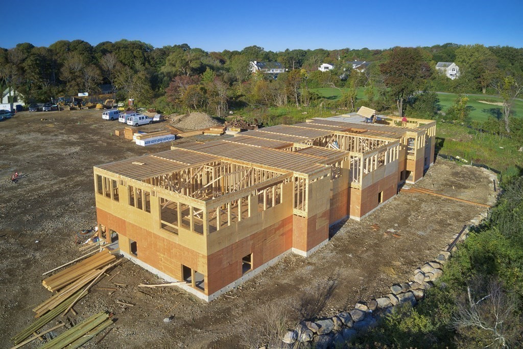 163 Atlantic Road, Unit 3 Gloucester, MA 01930 - Photo 6 of 12 a view of a house with a yard