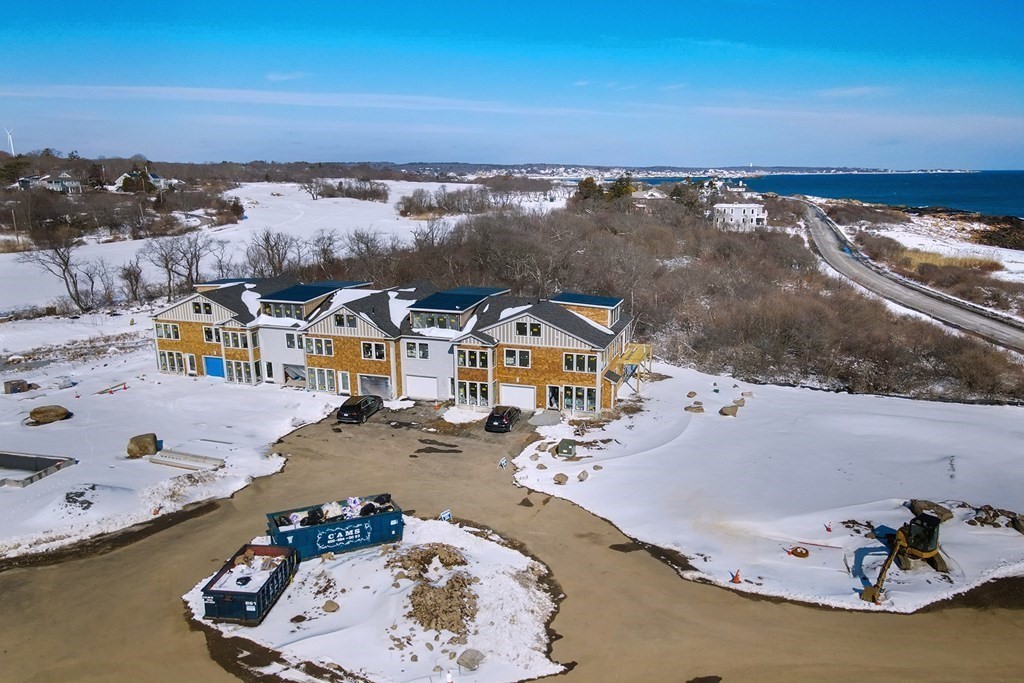 163 Atlantic Road, Unit 3 Gloucester, MA 01930 - Photo 8 of 12 an aerial view of a house with a ocean view