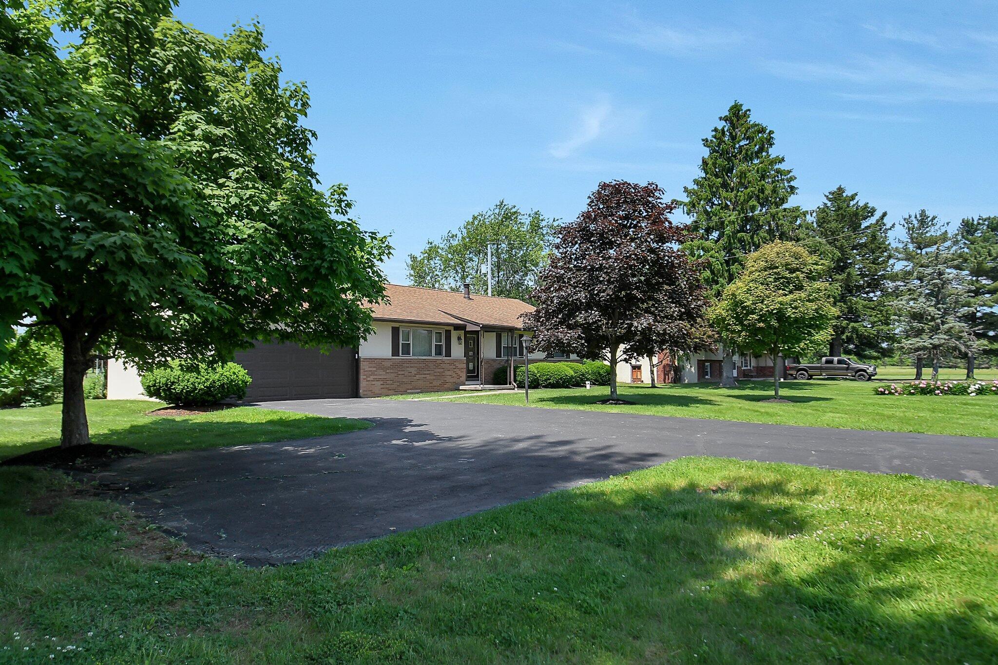 429 Amity Road Galloway, OH 43119 - Photo 4 of 27 View from the road, this driveway has a double turnaround drive or for parking.