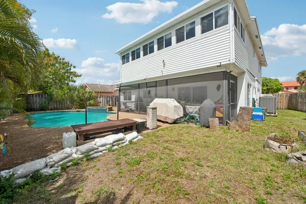 a view of a swimming pool with a patio