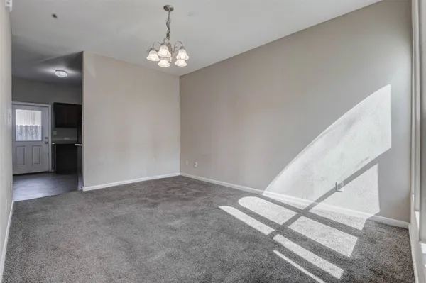a view of a livingroom with a furniture