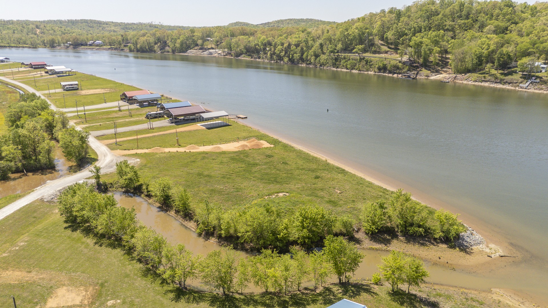 2027 Hardin Bottom River Road Clifton, TN 38425 - Photo 5 of 33 a view of a lake with a mountain