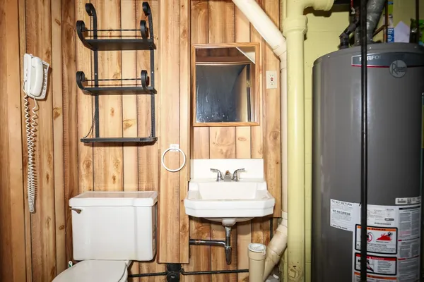 a bathroom with a sink and a window