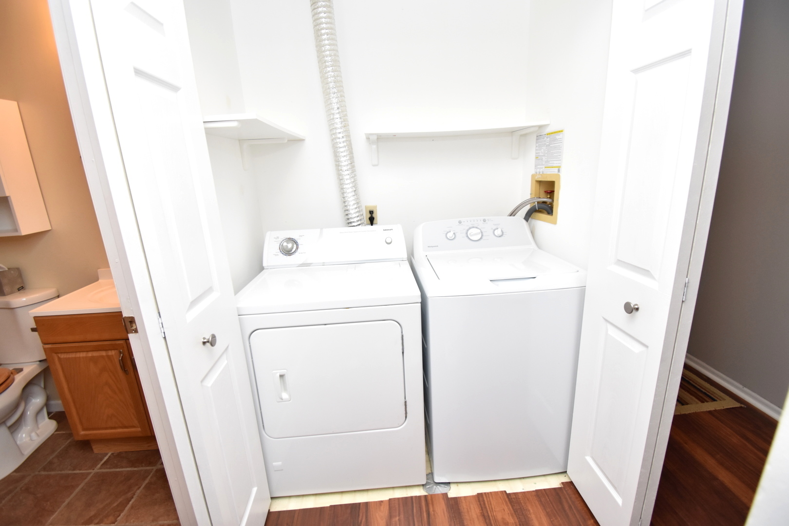 170 Hamlet Circle Montgomery, IL 60538 - Photo 13 of 13 a utility room with dryer and washer