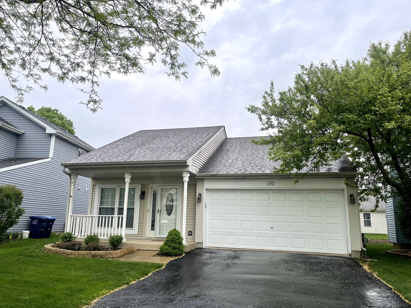 170 Hamlet Circle Montgomery, IL 60538 - Photo 2 of 13 a front view of a house with a yard
